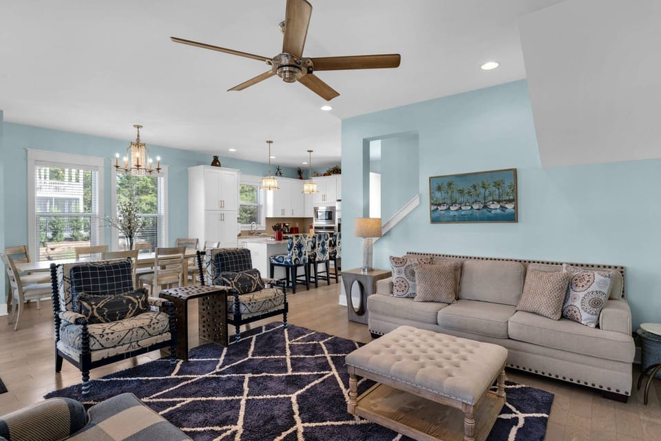 Open concept family room, kitchen, and dining area