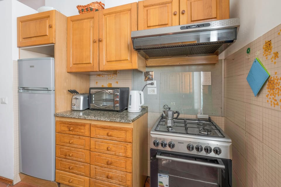 Apartment, City View | Private kitchen | Full-size fridge, microwave, oven, stovetop