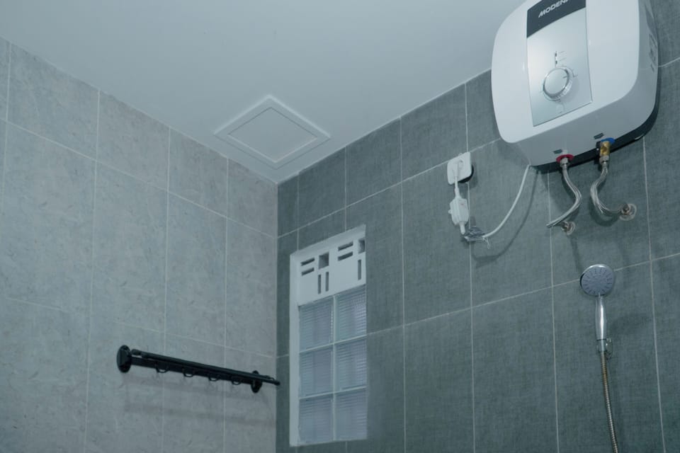 Shower, slippers, towels, soap