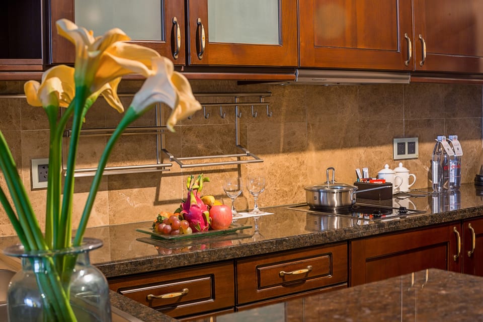 Executive Suite, 1 Bedroom | Private kitchen | Coffee/tea maker, fridge