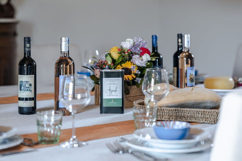 Tableware, Bottle, Drinkware, Table, Dishware, Wine, Flower, Stemware, Barware, Glass Bottle