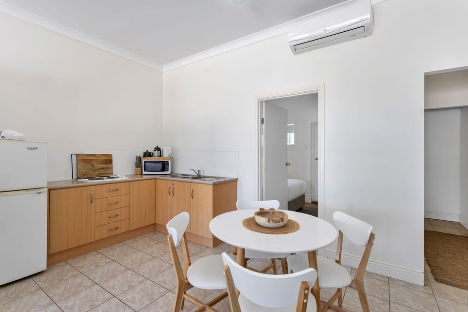 Two-Bedroom Apartment - Ground Floor  | Private kitchenette | Full-size fridge, microwave, stovetop, espresso maker