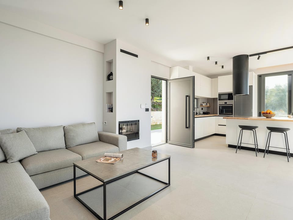 Villa | Living area | 55-inch Smart TV with cable channels