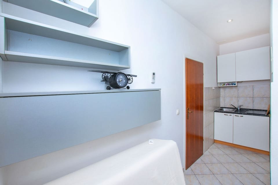 Apartment (A1) | Private kitchen | Fridge, microwave, stovetop, espresso maker