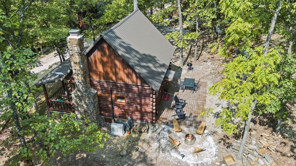 Our fully furnished, 1-bedroom, 1-bath log cabin is nestled within The Village at Red Bud Valley just outside Eureka Springs.