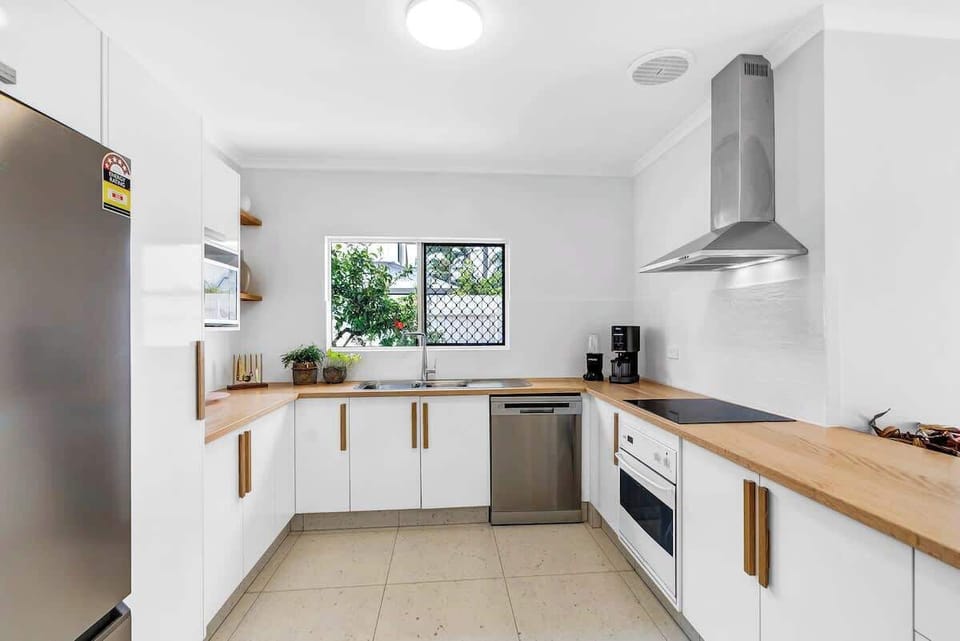 The stylish, fully renovated kitchen has all you need to cook meals, plus a dishwasher for easy clean-up. 
