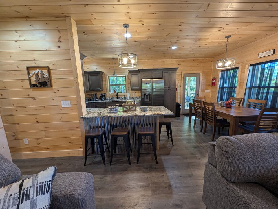 Open concept family room, dining and kitchen  