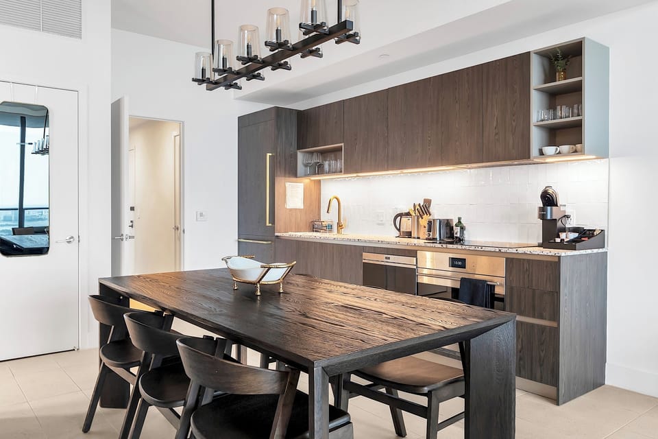 The dining area includes a large table and 6 chairs. Good for big family.
