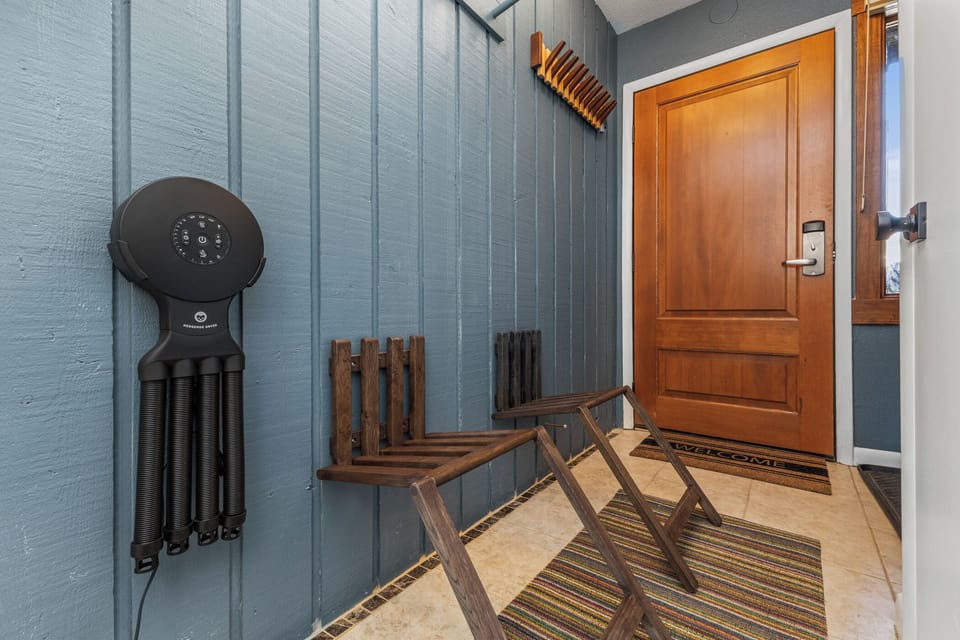 Entryway with Boot Dryer & Fold Out Chairs