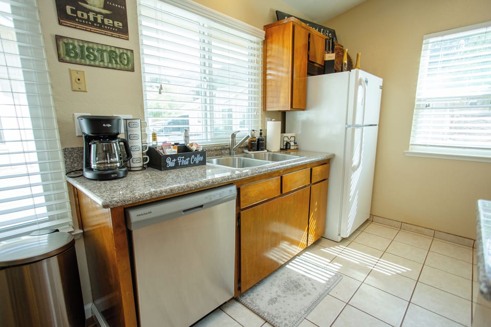 Refrigerator, dishwasher and fully-stocked kitchen