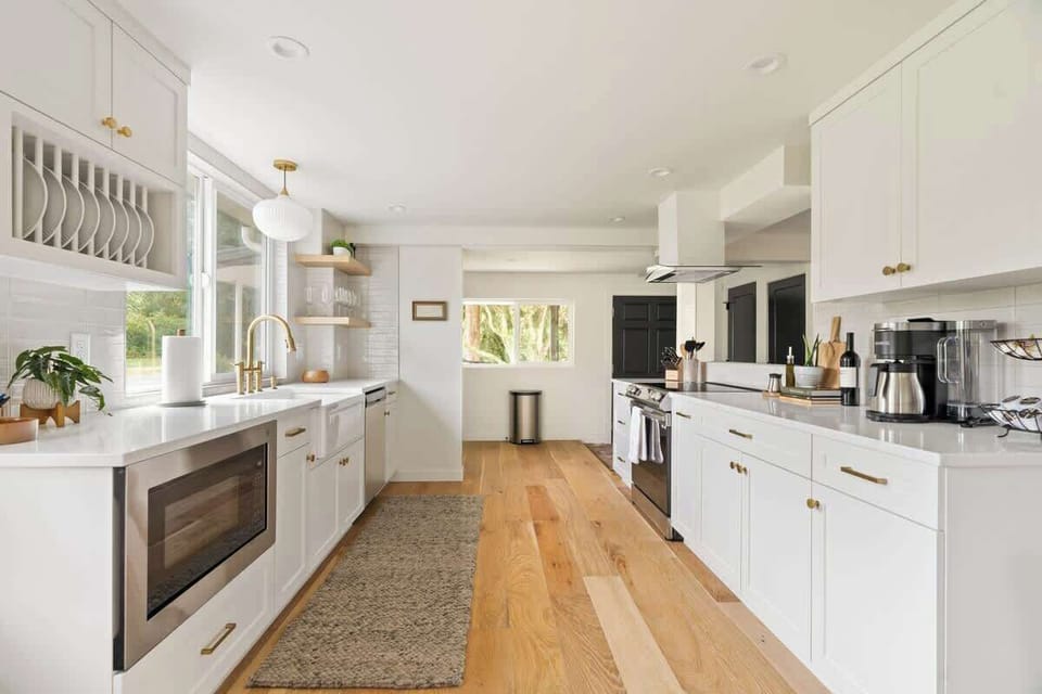 This beautifully designed kitchen features new appliances, custom cabinetry, and plenty of natural light—ideal for cooking up your favorite meals.