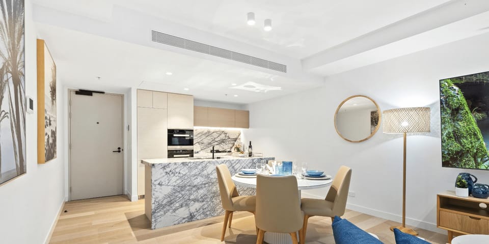 Fully equipped modern kitchen is right next to the dining area