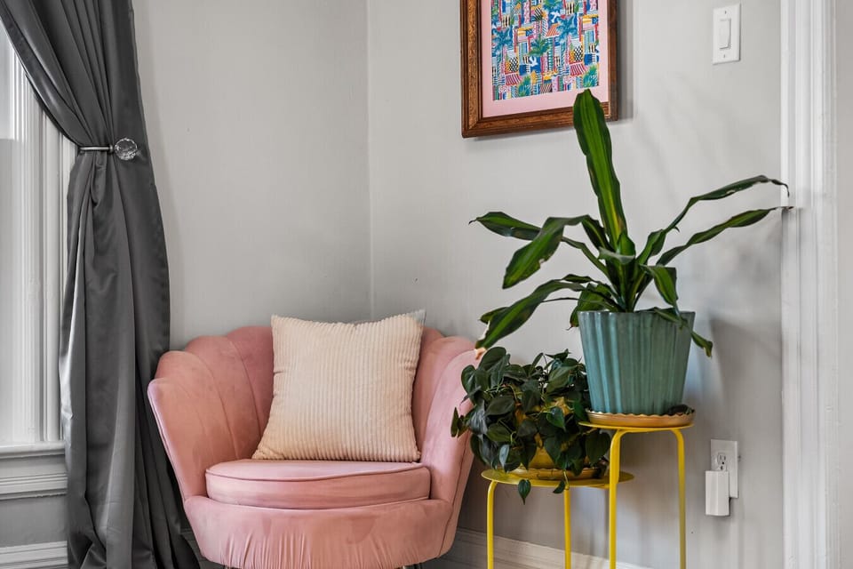 Extra seating, and plants can be found throughout the home!