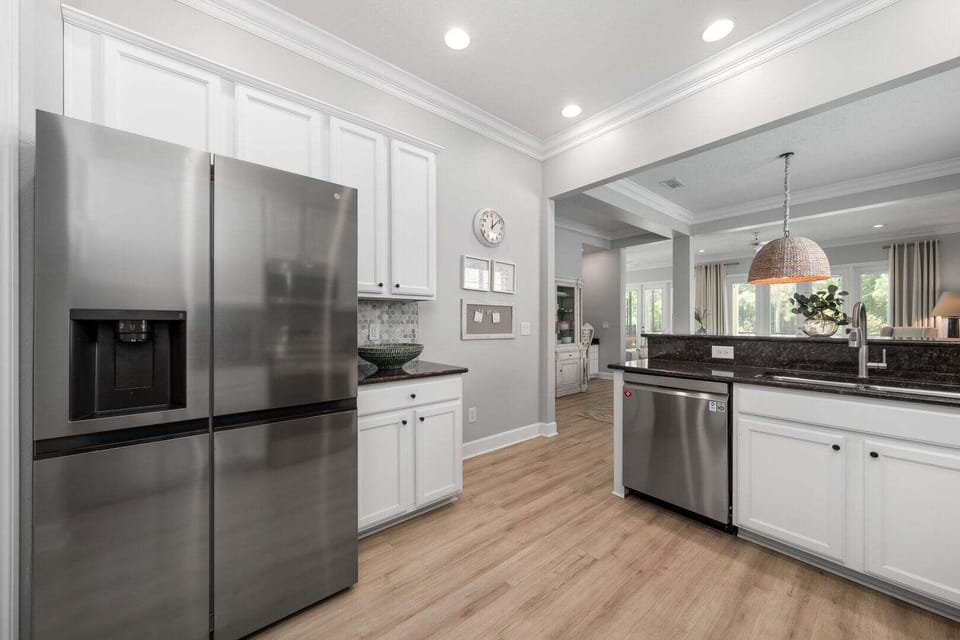 The kitchen also features a spacious fridge.