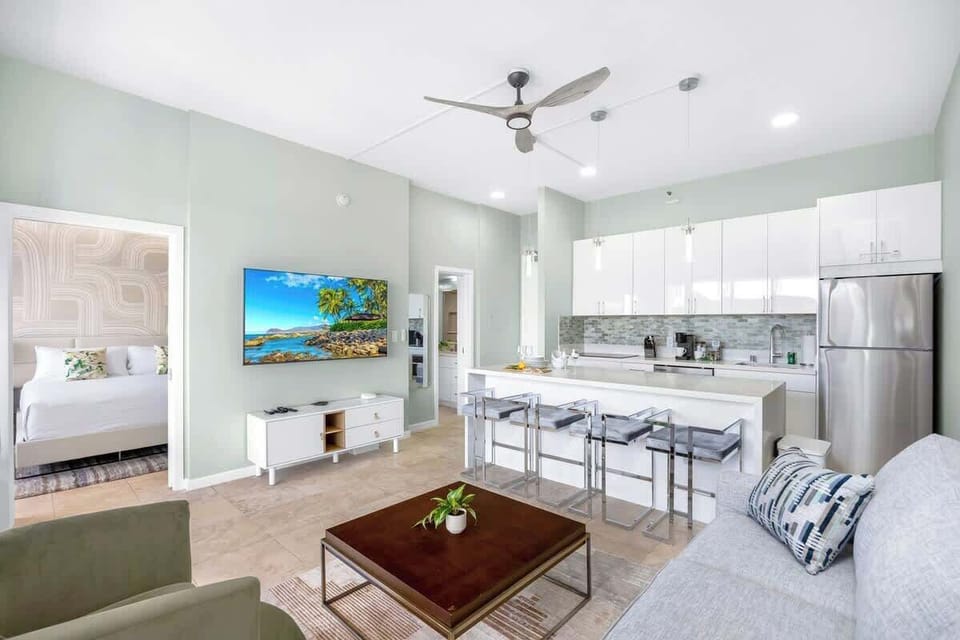 Overview of the living area, dining area, and kitchen