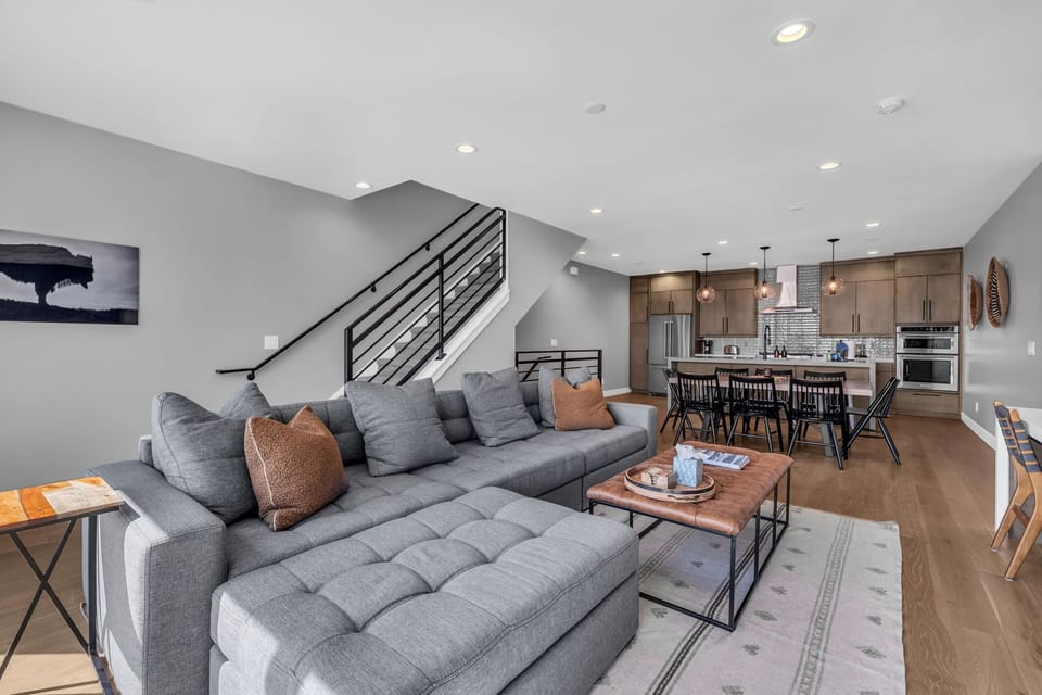 The open layout allows everyone to stay connected, whether preparing meals, sharing stories, or enjoying the incredible mountain surroundings.