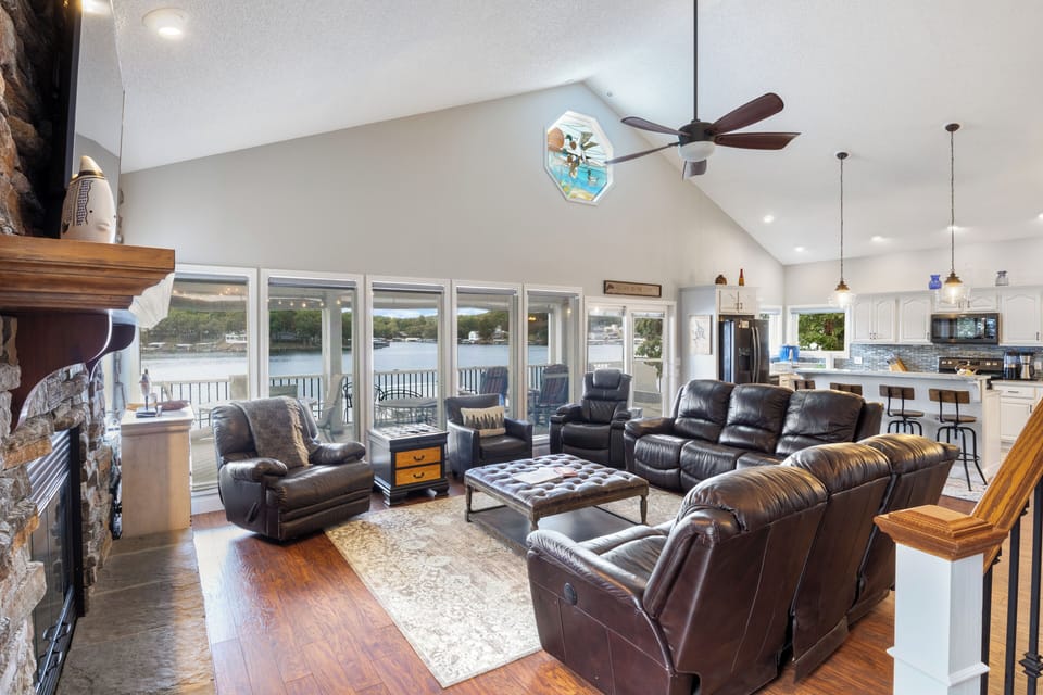 Open-concept living space with lake views and a modern kitchen.