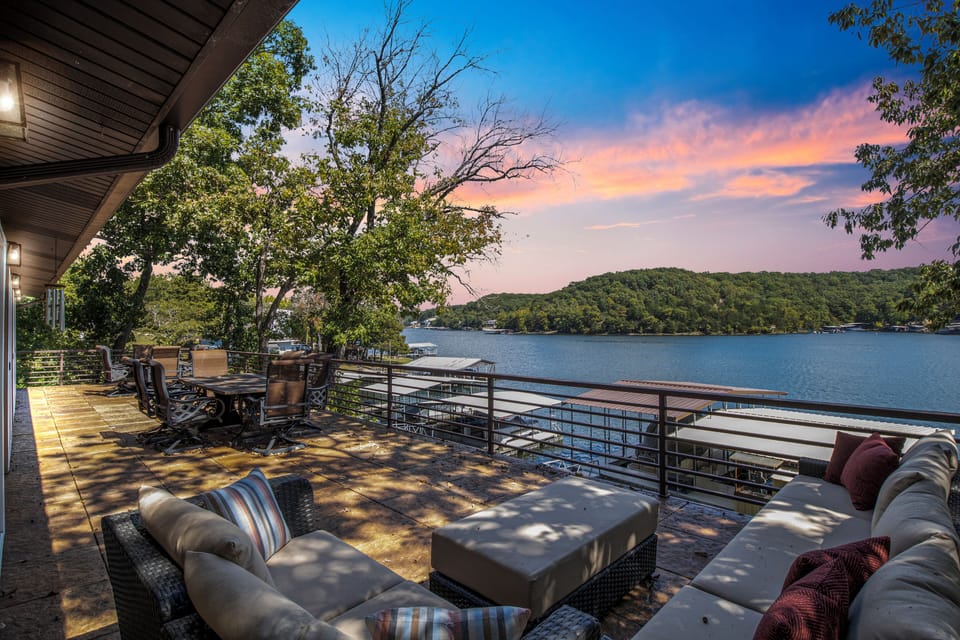 Unwind on the spacious deck with stunning sunset views over the serene lake.