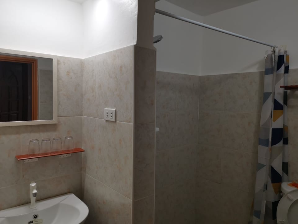 Comfort Quadruple Room | Bathroom | Shower, free toiletries, soap, shampoo