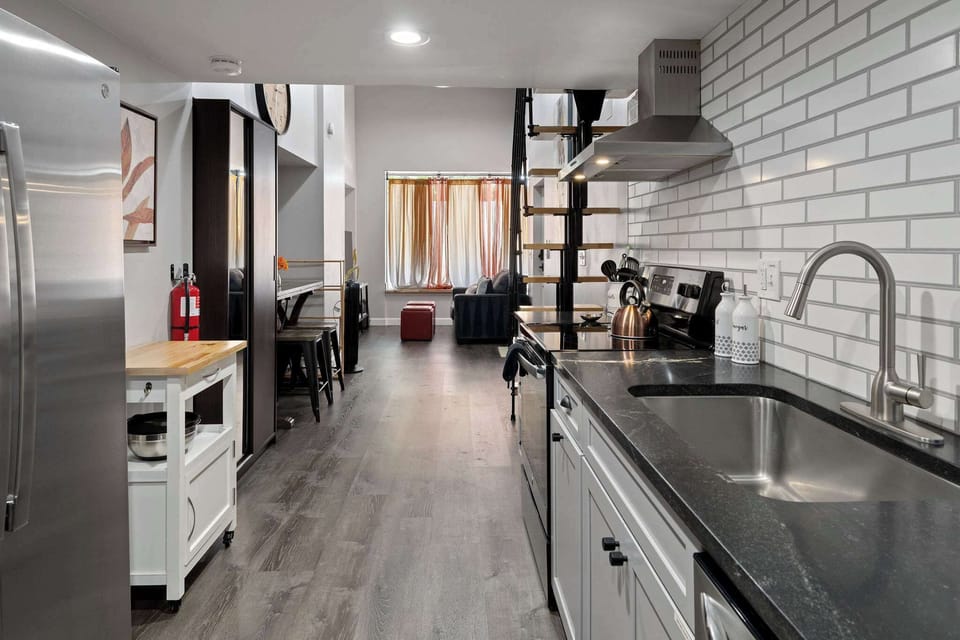 The entire unit is an open floor plan, with the bed in the loft.