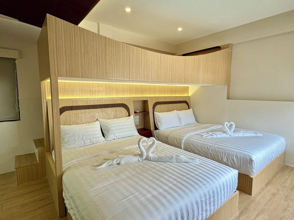 Luxury Studio Suite, Non Smoking, City View | Hypo-allergenic bedding, minibar, blackout drapes, iron/ironing board
