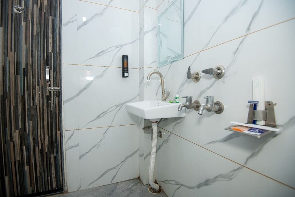Shower, rainfall showerhead, designer toiletries, hair dryer