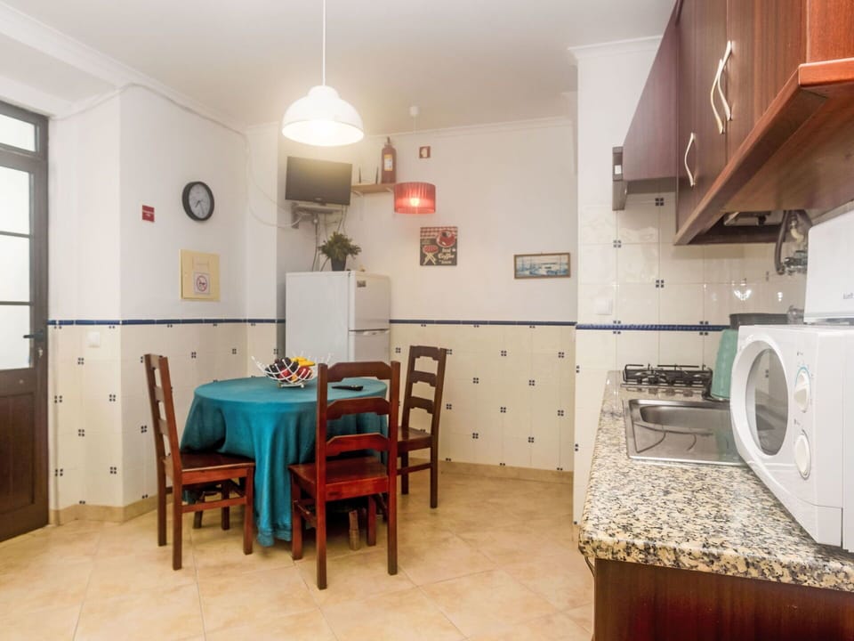 Furniture, Table, Property, Cabinetry, Building, Chair, Lighting, Wood, Interior Design, Door