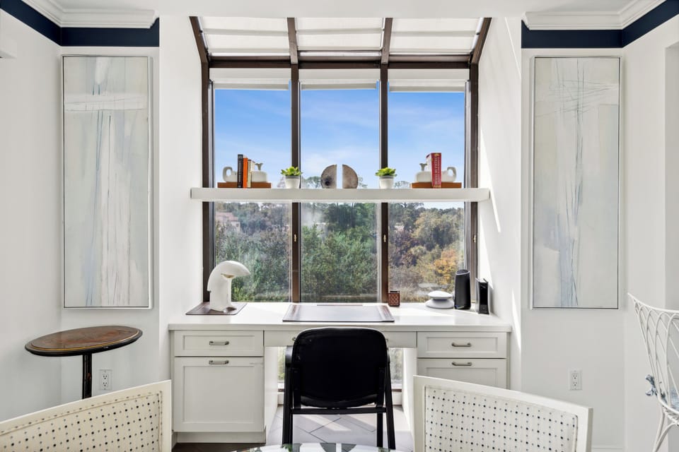 Dedicated work desk with marina views