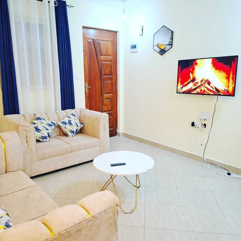 Classic Apartment, Balcony, City View | Living area | 24-inch Smart TV with digital channels