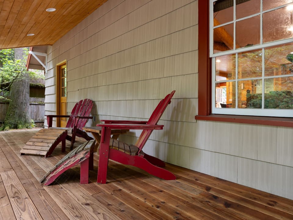 Kick back and relax! This deck with Adirondack chairs is the perfect spot to unwind and enjoy the fresh air.