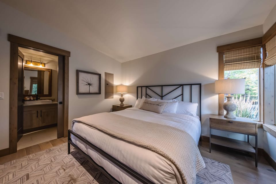 Bedroom 2 with queen bed and shared ensuite