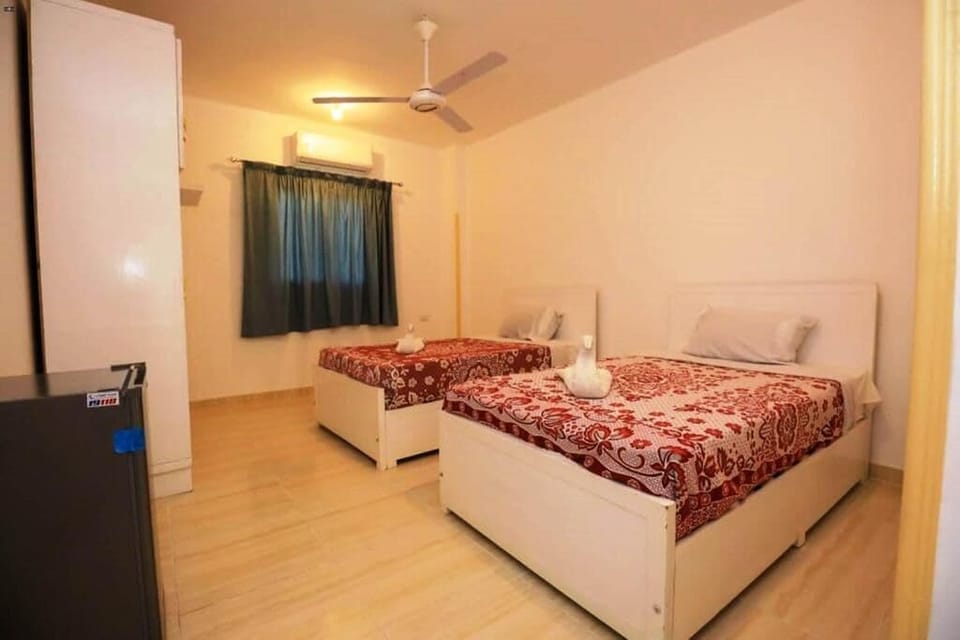 Premium bedding, blackout drapes, free WiFi, bed sheets