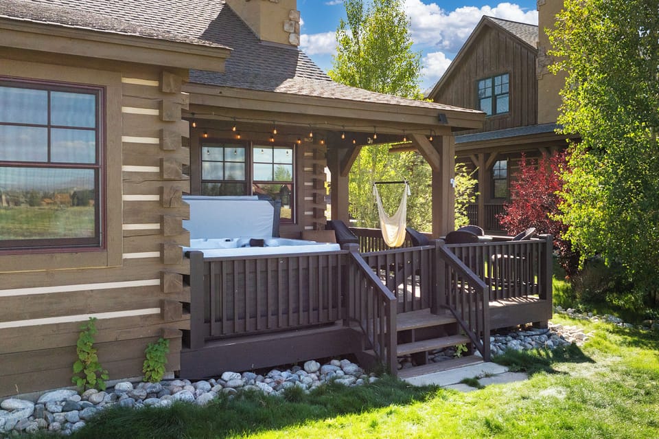 - Private hot tub on deck with outdoor seating and lights   - Relax under the stars in this peaceful retreat space   - Hammock and seating create perfect outdoor hangout