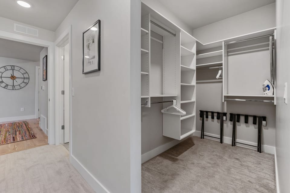 Primary Closet with Ironing Board