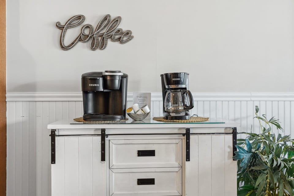 A retro-inspired coffee station, creating a cozy and inviting space to enjoy your favorite beverages in a warm, nostalgic atmosphere.