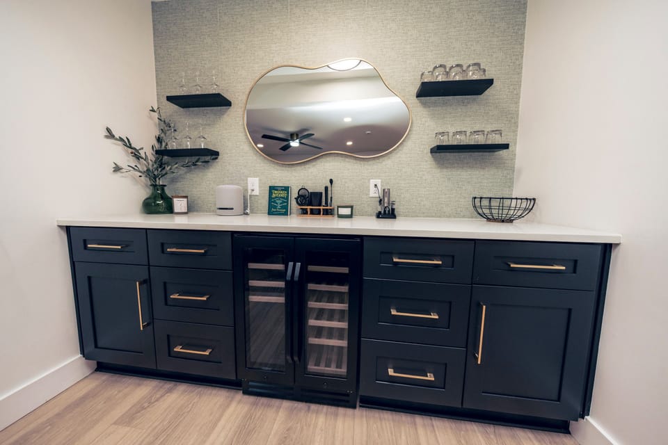 Equipped beverage bar with wine fridge and Alexa to set the mood