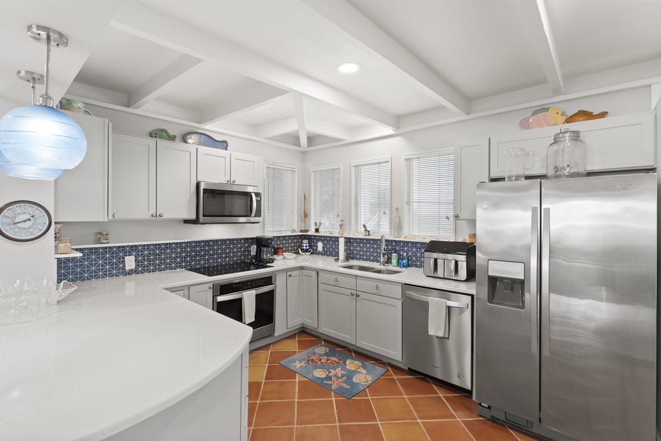 Bright and fully equipped kitchen ready for home cooked meals