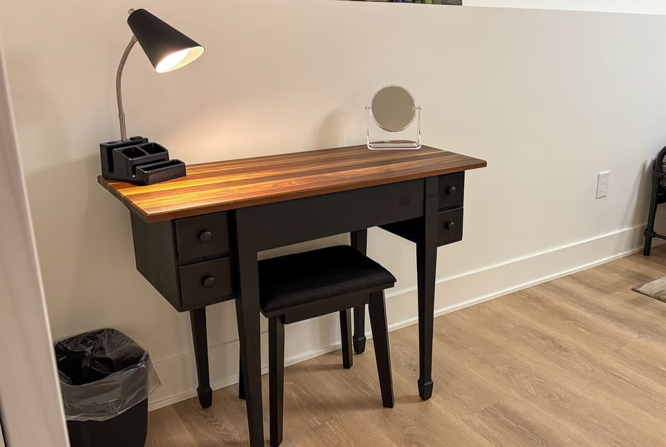 A workspace/vanity in the basement bedroom