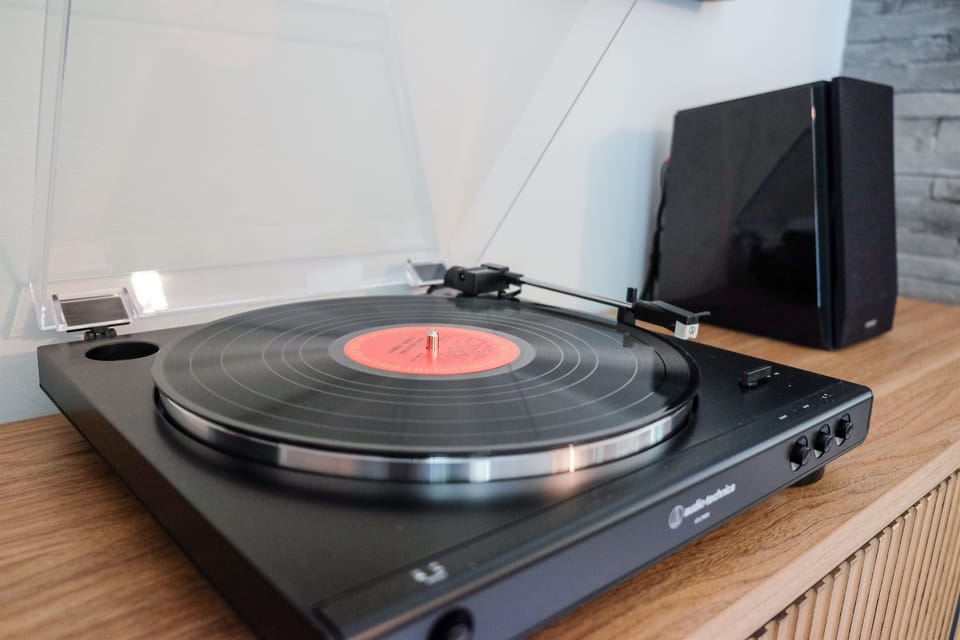 Audio-Technica turntable (record player) with Edifier Speakers, Assortment of Records