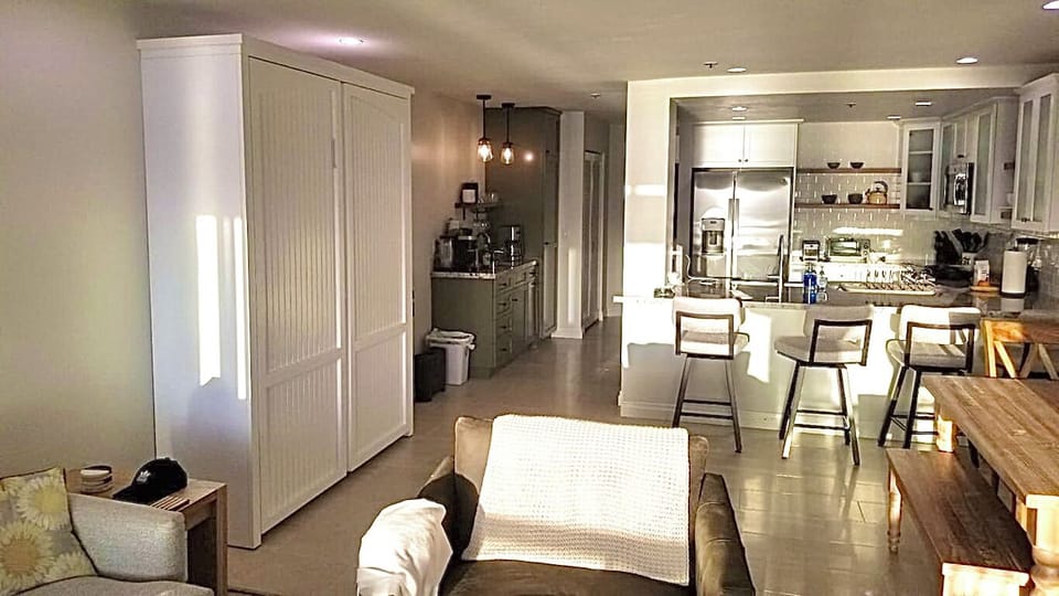 Murphy bed opens out and queen size bed pulls down