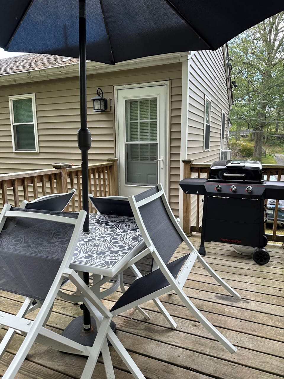 Deck with propane grill. 