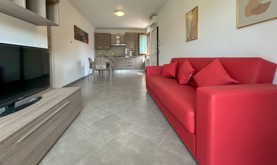 Deluxe Apartment, 2 Bedrooms, Non Smoking, Patio | Living area | 40-inch Smart TV with satellite channels, Netflix, streaming services