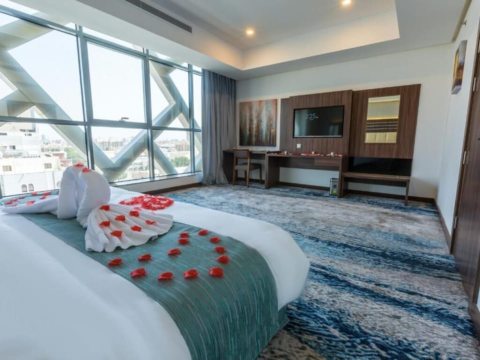 In-room safe, desk, laptop workspace, blackout drapes