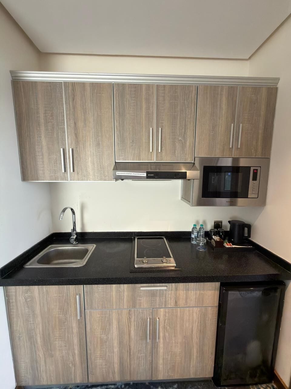 Executive Suite | Private kitchenette | Coffee/tea maker, electric kettle, eco-friendly cleaning products