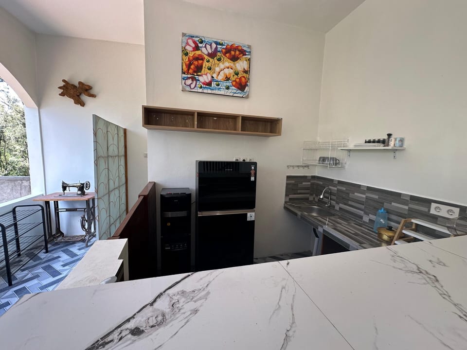Shared fridge, microwave, coffee/tea maker, electric kettle