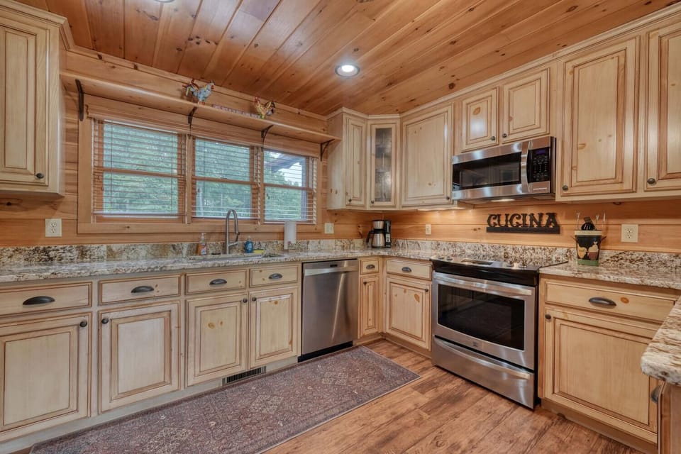 "Fully equipped kitchen with granite counters and stainless appliances."