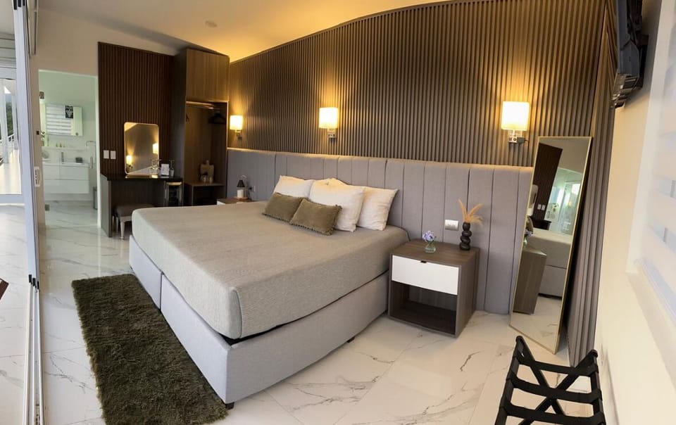Deluxe Room, 3 Bedrooms, Vineyard View | Minibar, desk, laptop workspace, free WiFi