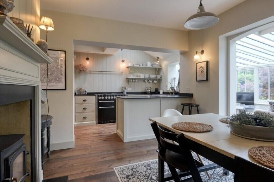 Railway Cottage: Kitchen and Dining with log burner