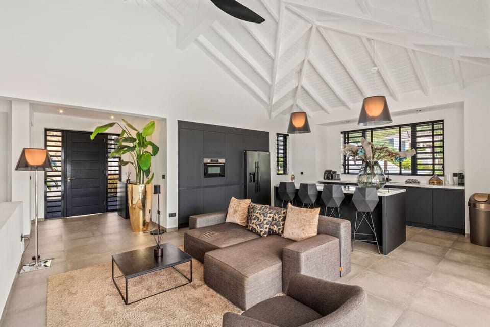 Step into your stylish sanctuary! This open living area combines modern elegance with cozy comfort, perfect for lounging or entertaining. Enjoy the chic design and let the good times roll!