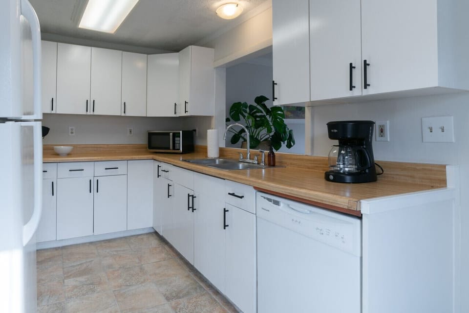 A well-equipped kitchen with plenty of counter space and storage.